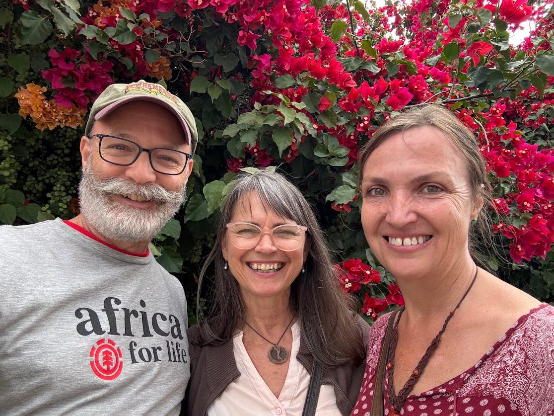 Among the bougainvillea blooms, we found Anna. An artist whose smile is as soft as her strokes. 🎨🌸