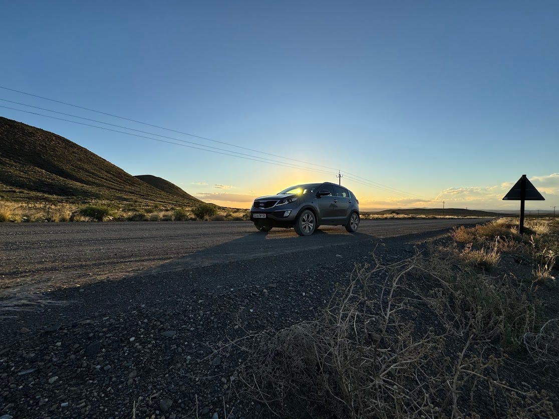 Dust curls behind us on the road to Prince Albert, the sun bowing low, and the silence stretching wide. 🚙🌅