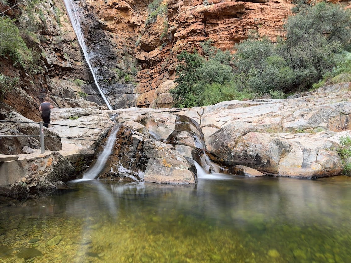 Tumbling down the Swartberg's red stone bones, Meiringspoort whispers where water remembers. 💦⛰️
